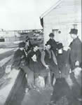 A growler gang in session [the "Montgomery Guards" at the West 37 Street dock]