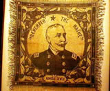 Dewey tapestry with "Remember The Maine" slogan