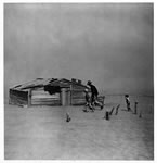 Dust bowl homestead; father and children