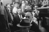 King is led away after being sentenced to 4 months in prison, 10/25/60