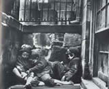 Street Arabs in sleeping quarters [areaway, Mulberry St.]