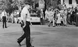 Little Rock police keep an eye on white protestors, 9/23/57