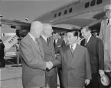 Diem is met at the airport by President Eisenhower and Secretary Dulles, 5/8/57