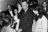 LBJ takes the oath of office aboard Air Force One